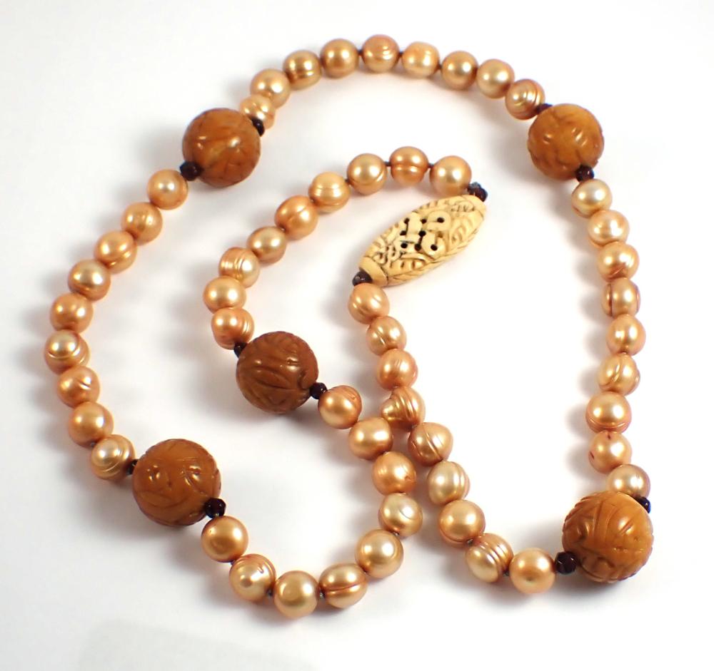 CARVED BONE, PEARL AND GARNET