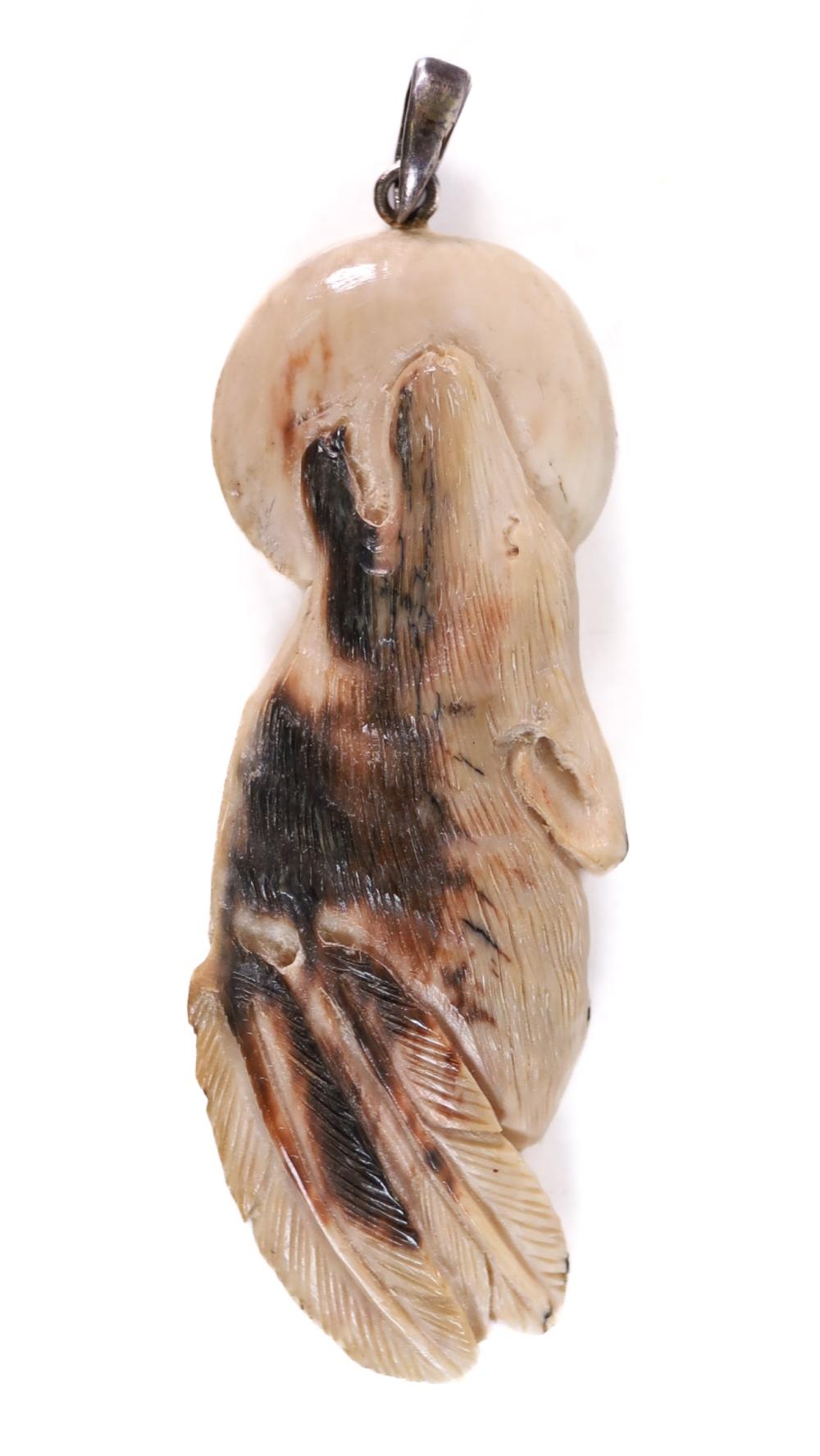 CARVED BONE PENDANT OF WOLF &
