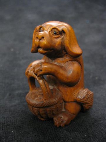 Carved Boxwood Netsuke of a Dog