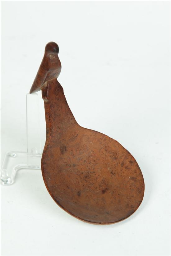 CARVED BURL BUTTER PADDLE. 
