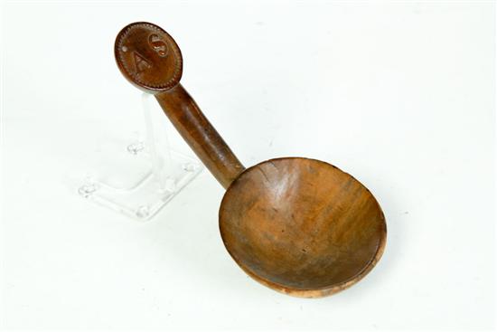 CARVED BUTTER PADDLE.  American 