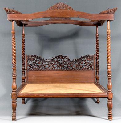 Carved Colonial four poster bed,
