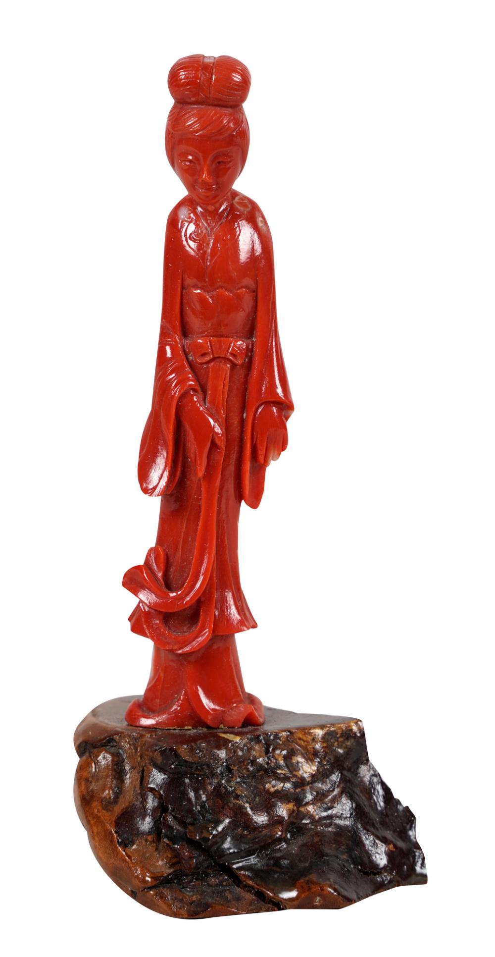 CARVED CORAL GUAN YINon wooden base