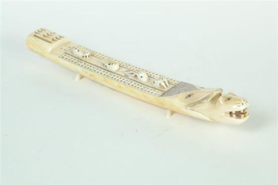 CARVED CRIBBAGE BOARD.  Eskimo 