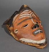 CARVED DECORATED WOOD AND CLOT
