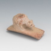 CARVED EFFIGY PIPE OF AN OPSSO