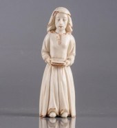 CARVED FEMALE FIGUREA well nat