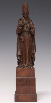 CARVED FIGURE OF A BISHOP, HAR