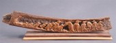CARVED FRIEZE DEPICTING PENGUI
