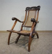 CARVED FRUITWOOD CANED ARMCHAI