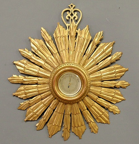 Carved giltwood barometer by Scholz