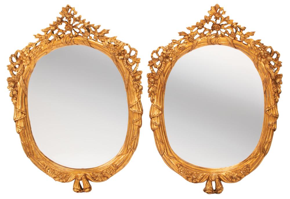 CARVED GILTWOOD OVAL MIRRORSPair of