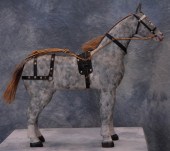 Carved gray dapple painted woo