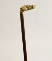 CARVED GREYHOUND HEAD HANDLED