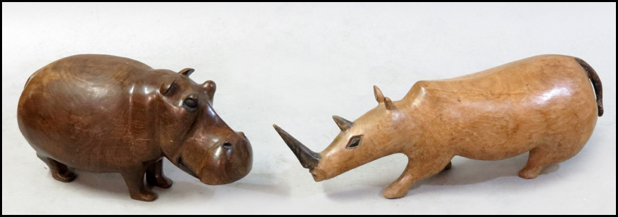 CARVED HARDWOOD RHINOCEROS.
