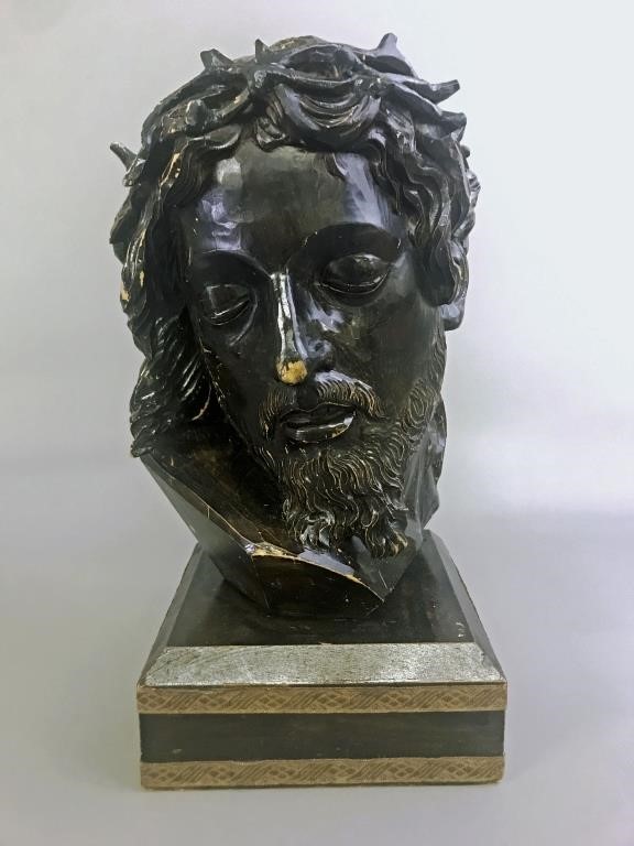 Carved head of Christ with crown of