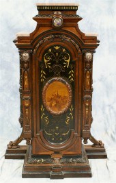 Carved, inlaid, and ebonized w
