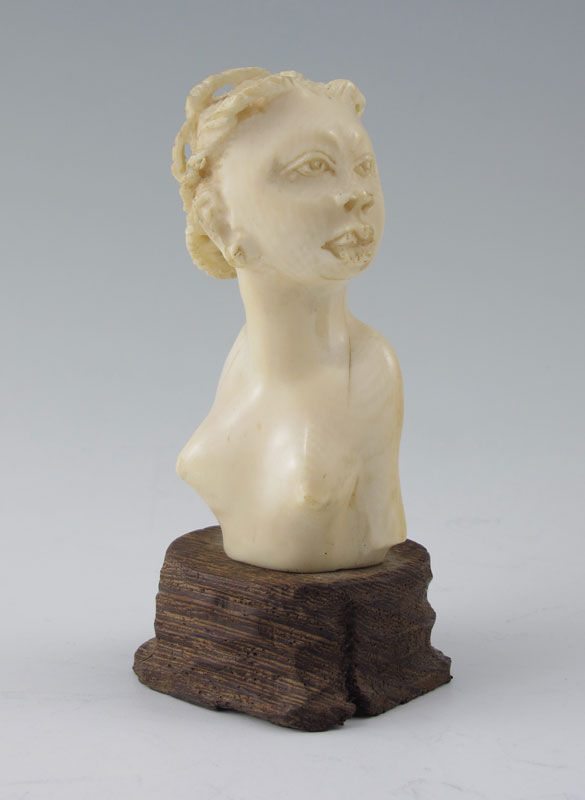 CARVED IVORY BUST AFRICAN WOMAN: