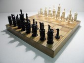 Carved ivory chess set. Half u