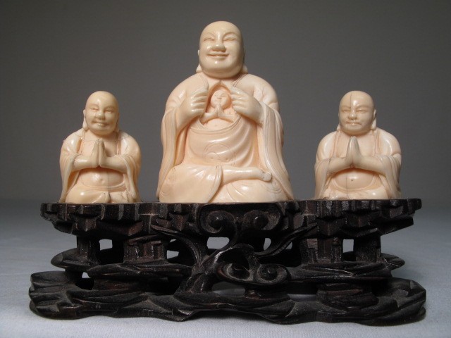 Carved ivory display depicting