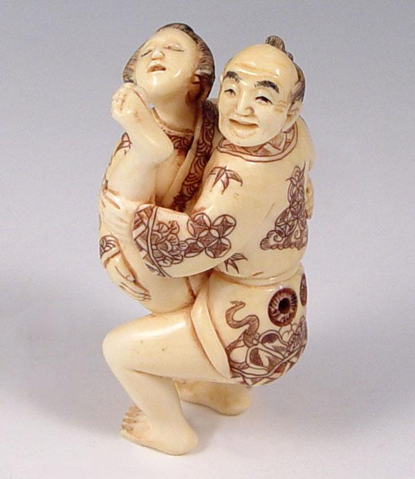 CARVED IVORY EROTIC NETSUKE:
