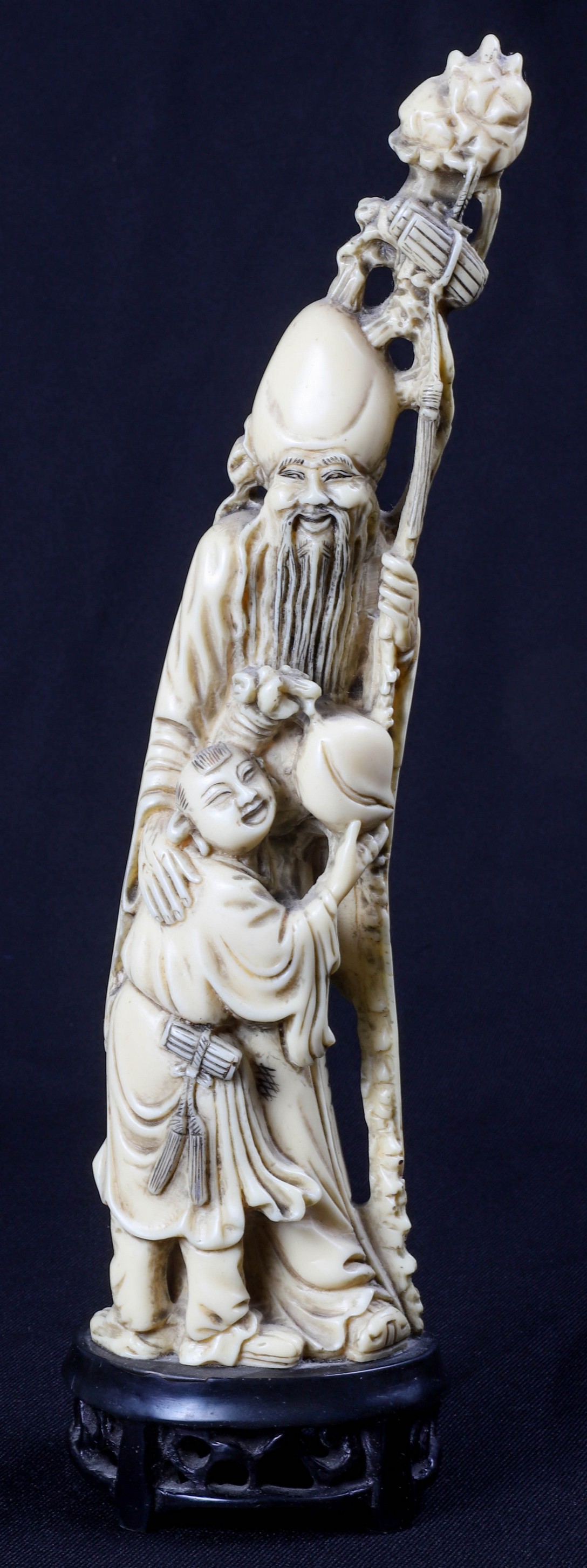 Carved ivory figure of a Chinese