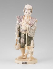 CARVED IVORY FIGURE OF AN ACTO
