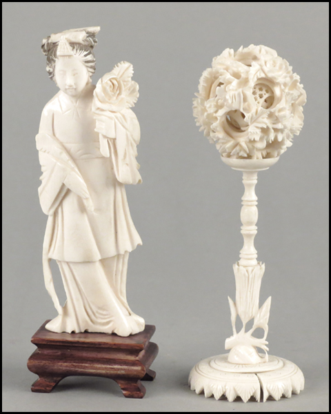 CARVED IVORY FIGURE ON STAND.