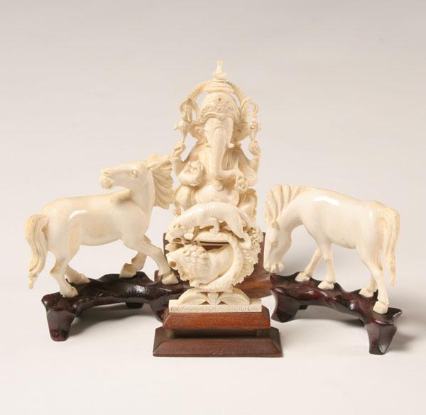 Carved ivory figures including an