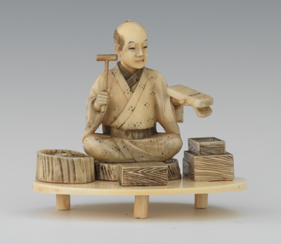 Carved Ivory Figurine of a Box