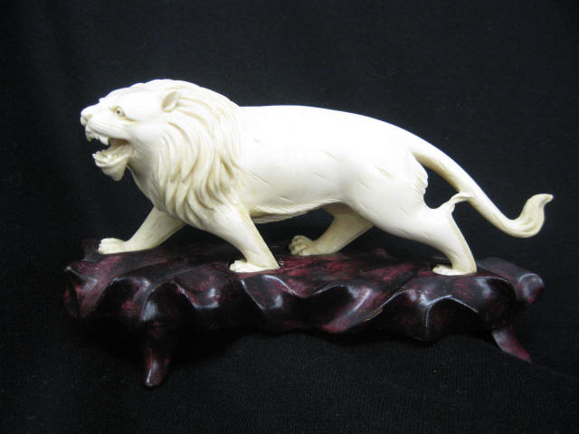 Carved Ivory Figurine of a Lion 6''