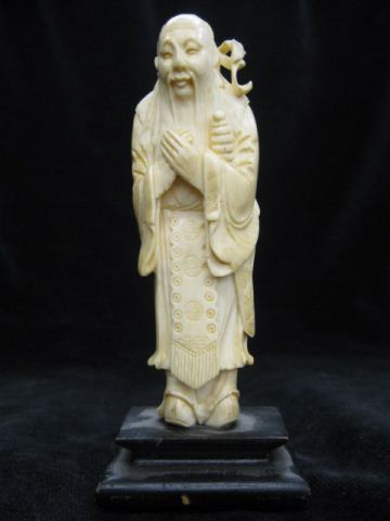 Carved Ivory Figurine of an Old Man