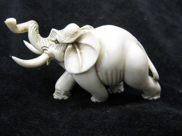 Carved Ivory Figurine of an