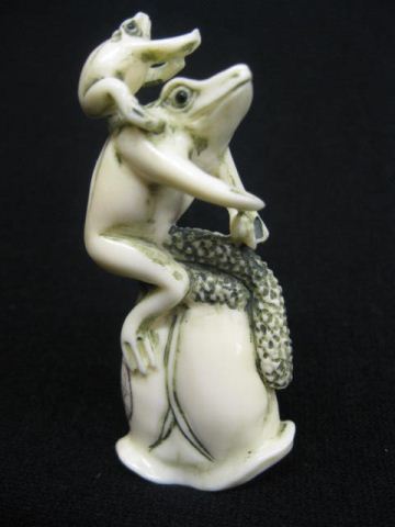 Carved Ivory Figurine of Frogs on