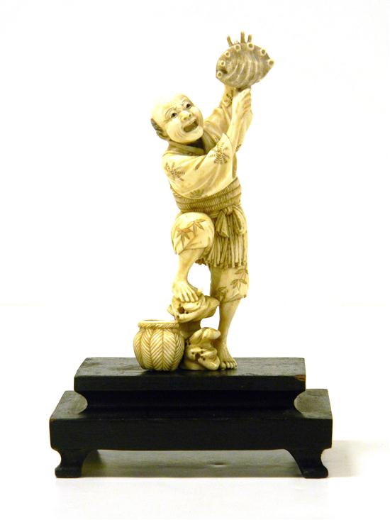 Carved ivory male figure 
