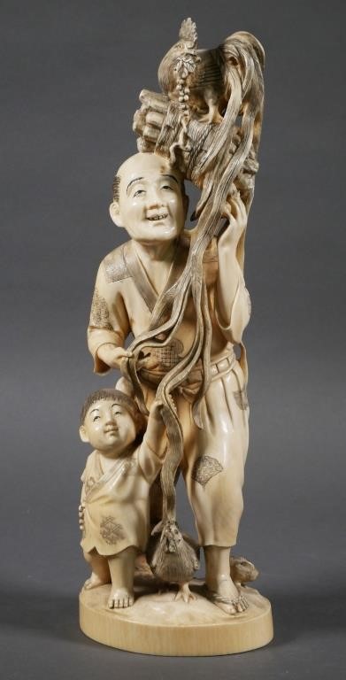 CARVED IVORY MAN WITH ONAGADORI,
