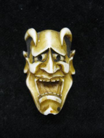 Carved Ivory Netsuke of a Devil's