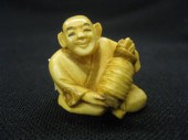 Carved Ivory Netsuke of a Seat