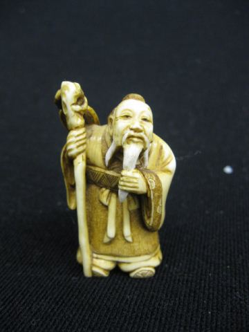 Carved Ivory Netsuke of an Old
