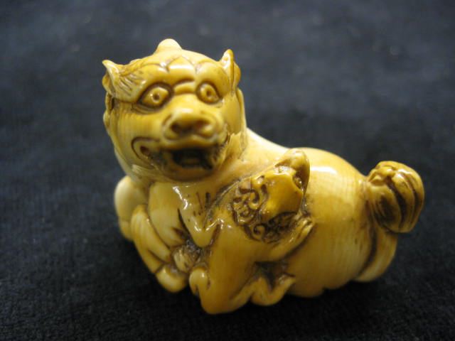 Carved Ivory Netsuke of Foo Dog &