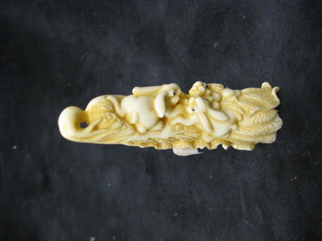 Carved Ivory Netsuke of Rabbits &