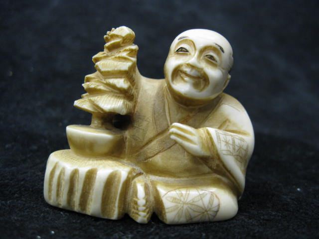 Carved Ivory Netsuke of Seated