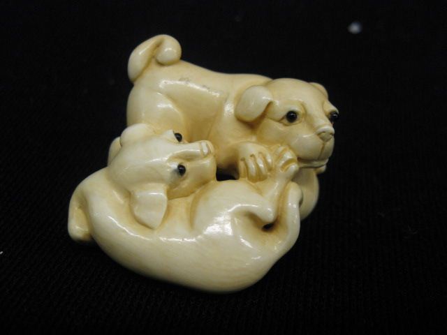 Carved Ivory Netsuke of Two Foo Dog