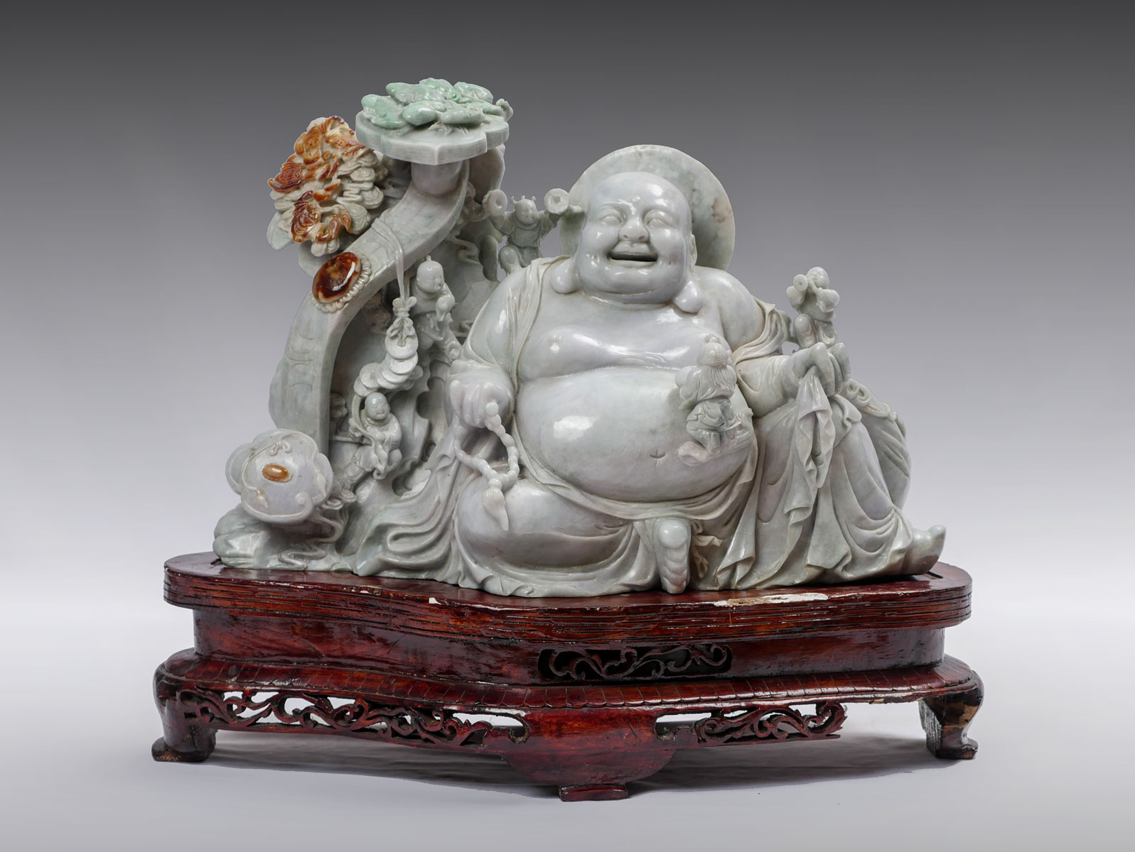 CARVED JADE SEATED HAPPY BUDDHA: