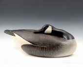CARVED LLOYD JOHNSON RECUMBENT