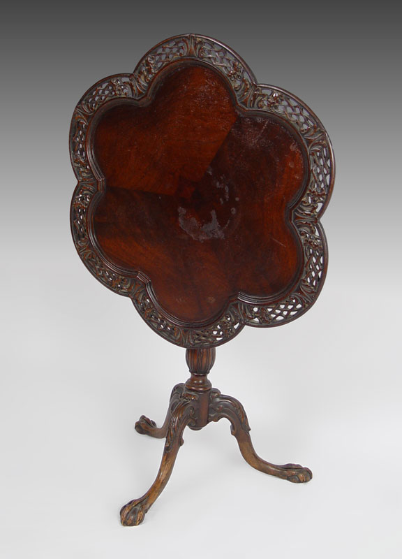 CARVED MAHOGANY BALL AND CLAW