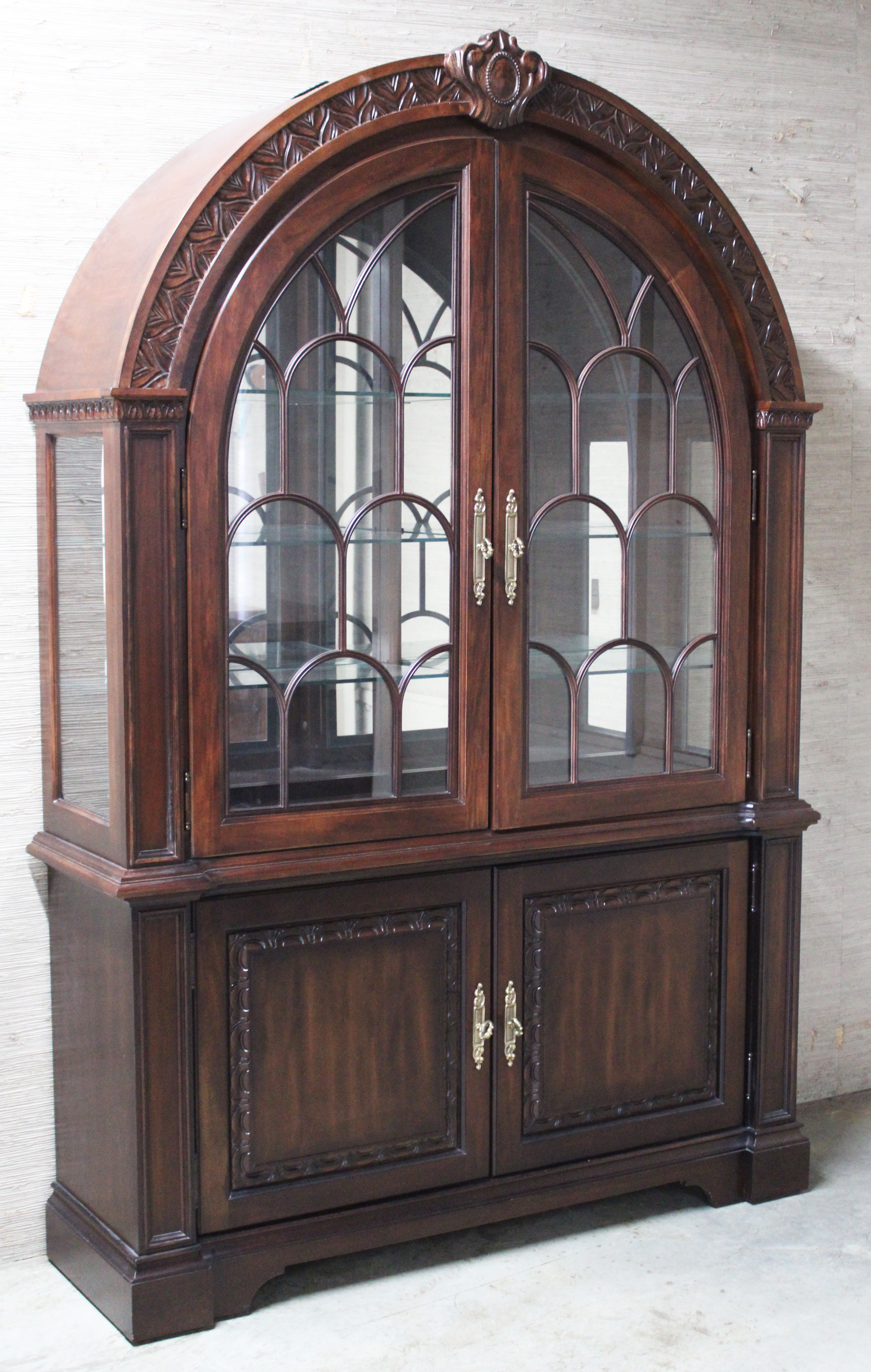 CARVED MAHOGANY CHINA CABINET BY
