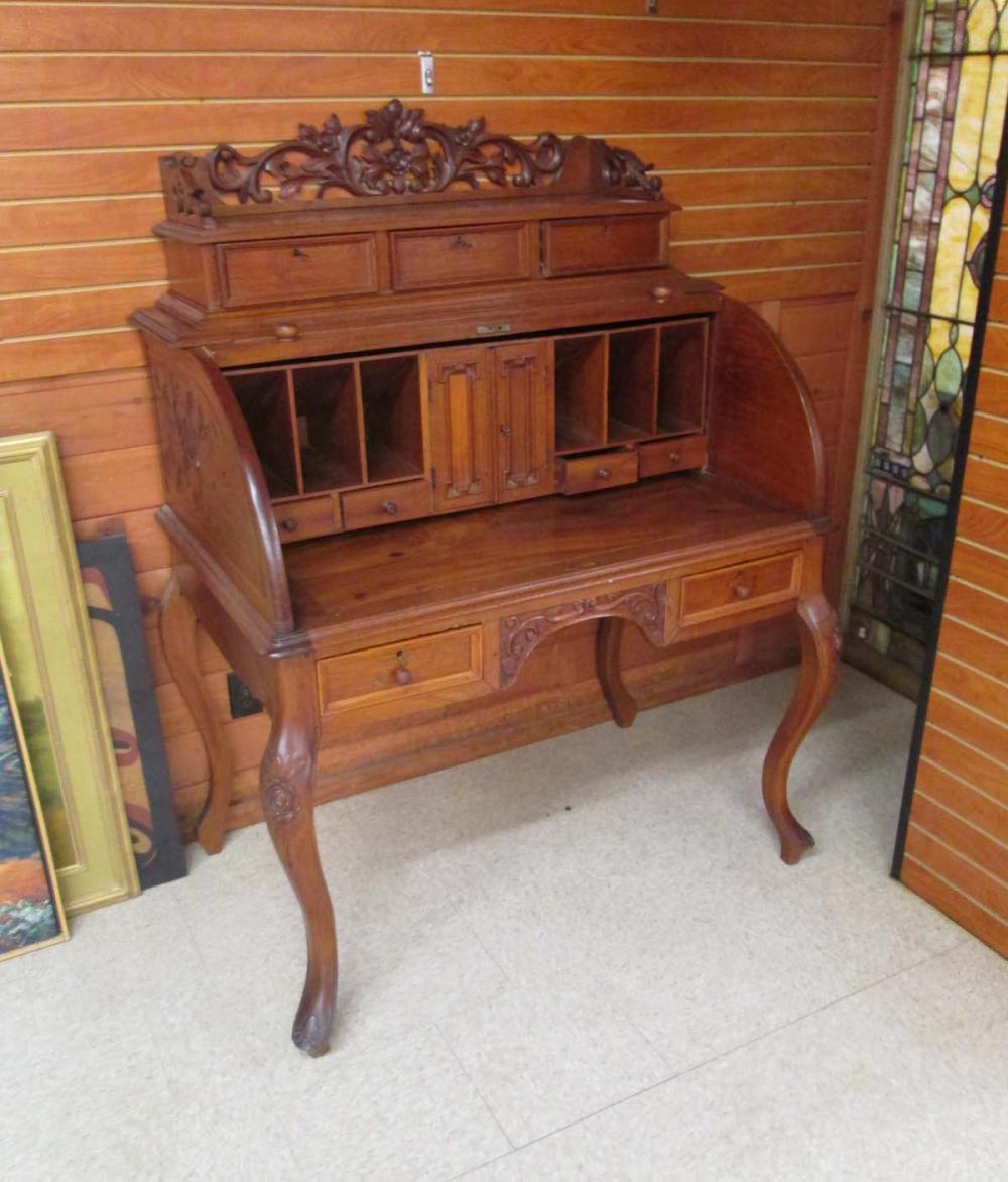 CARVED MAHOGANY CYLINDER ROLL-TOP