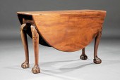 CARVED MAHOGANY DROP-LEAF TABL