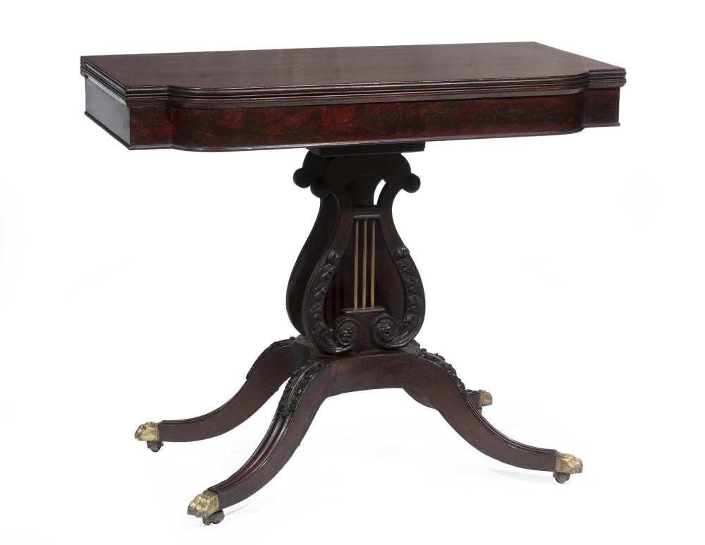 CARVED MAHOGANY GAMES TABLE ATTR.
